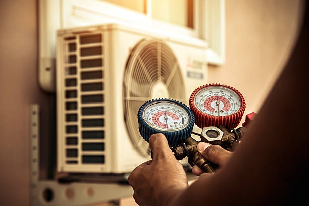 Professional Hvac technician working in Huntingtown, MD